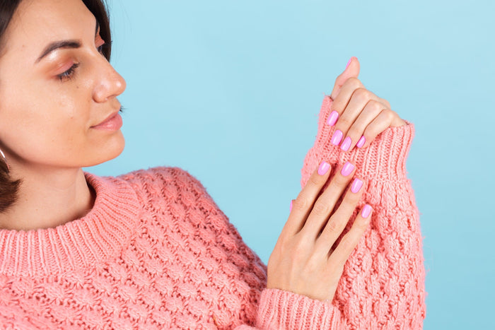 woman-with-strong-bright-pink-nail-color-manicure