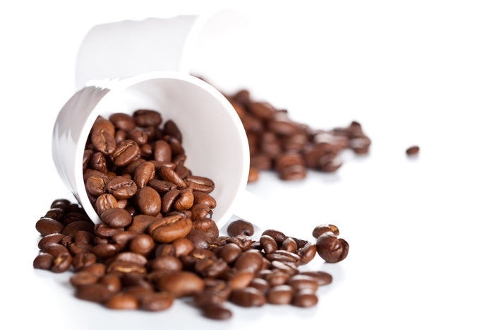 close up coffee beans on a white table
